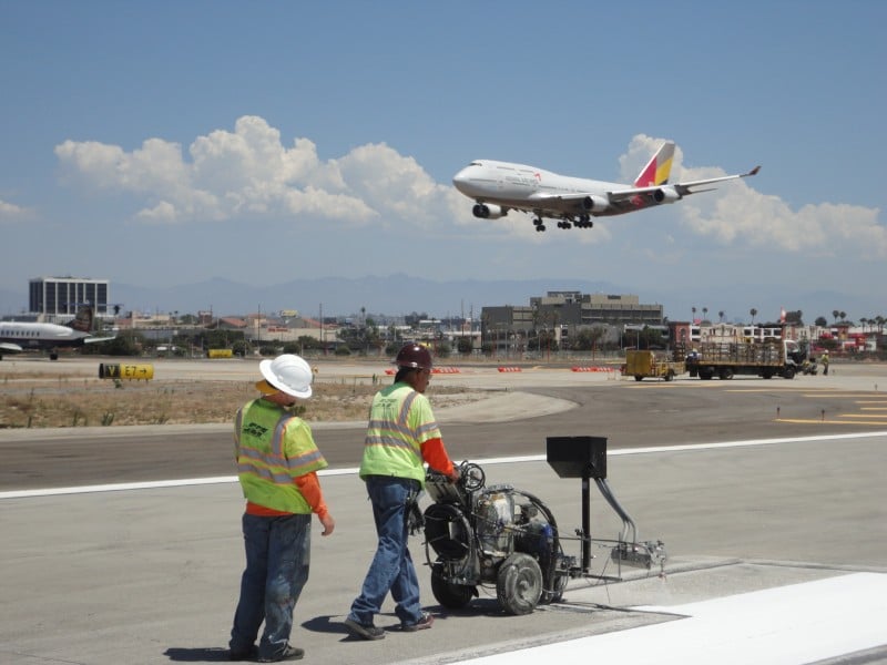 Runway and taxiway striping at an airport facility